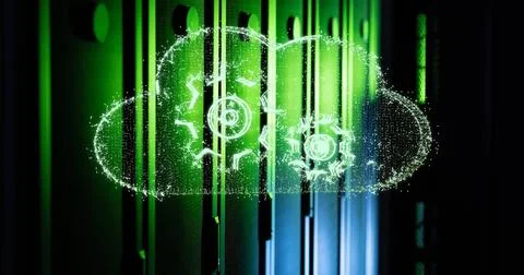 Cloud network processing data over green lit, dark computer server room Foto stock