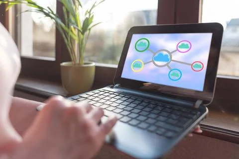 Cloud networking concept on a laptop screen Foto stock