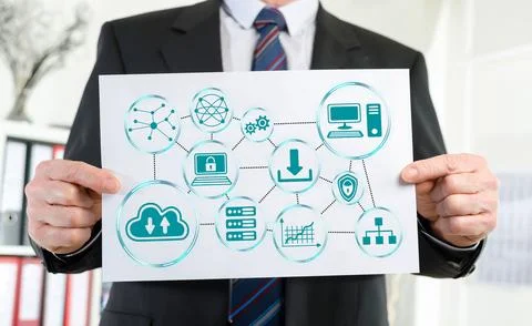 Cloud networking concept shown by a businessman Stock Photos