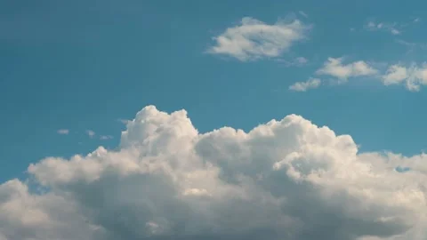 Cloud only view of white churning clouds in a light blue sky. Stock Footage 155168943