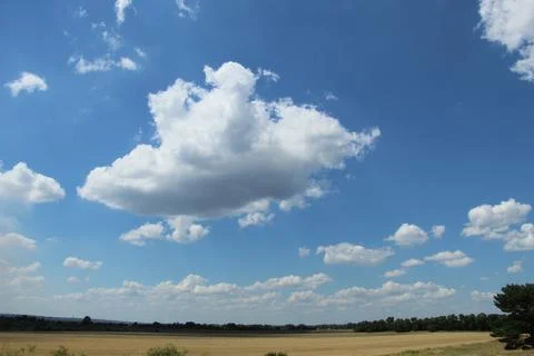 Cloud over the field Stock Photos