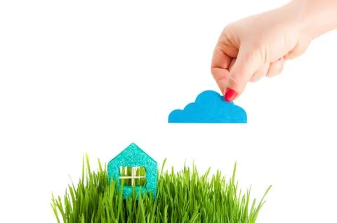 Cloud over the house in a grass Stock Photos