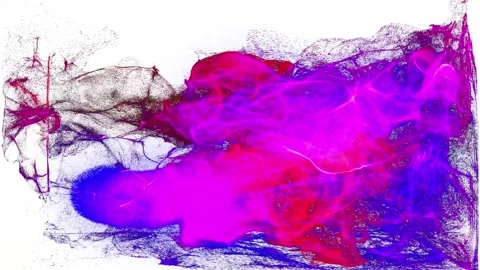 Cloud of particles on white bg. Multicolored particles spread in camera like Ink Stock Footage 223236948