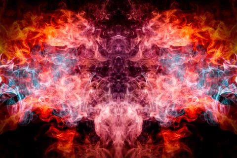Cloud of red and blue smoke  in the form of a skull, monster, dragon  on a bl Stock Photos