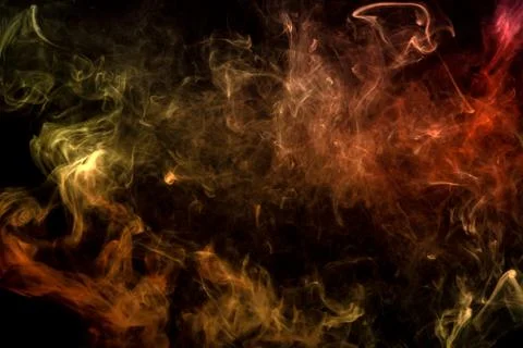 Cloud of red and orange smoke on a black isolated background. Background from Foto stock