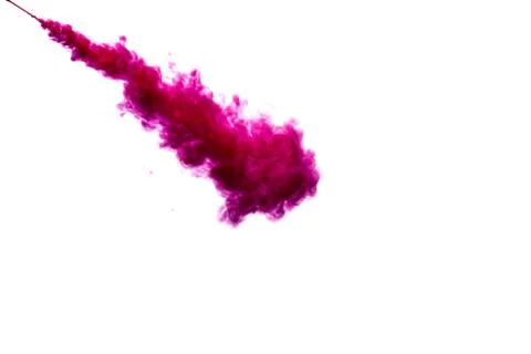 A cloud of red paint is released into the clear water. Isolate on a white bac Stock Photos