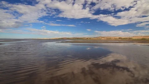Cloud reflection in the lake. Lake Durgun Nuur, Mongolia Video stock 72337809