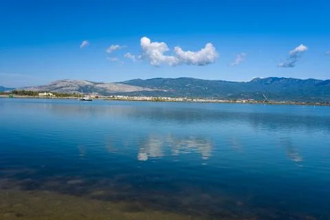 Cloud reflection on Missolonghi salt lagoon Stock Photos