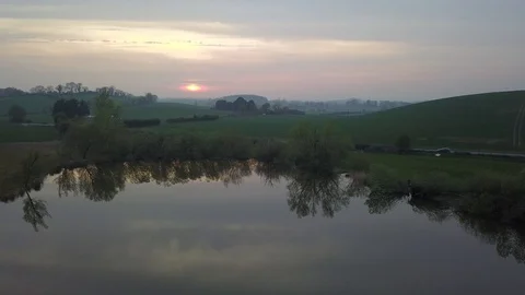 Cloud reflections on a calm lake Stock Footage 108692490