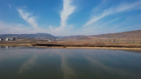 Cloud reflections in the lake Stock Footage 238805968