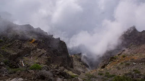 Cloud rising from mountainside in La Palma Mountains Timelapse 6K Stock Footage 315102603