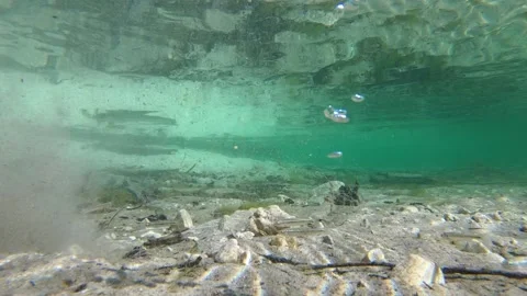 Cloud of sand particles slowly float in ... | Stock Video | Pond5