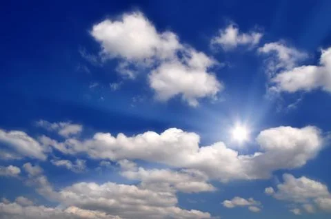 Cloud scape and sunshine with blue sky background Stock Photos