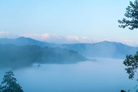 Cloud Sea and Snow Capped Mountains in Putao Stock Photos