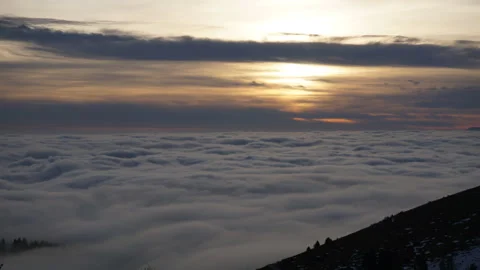 Cloud sea time-lapse at sunset from a mountain top shot at 50mm [2] Stock Footage 229772535