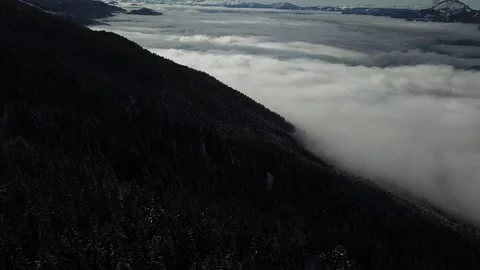 Cloud sea, towering mountains stand majestic, Alpes-Belledonne, France Stock Footage 301347874