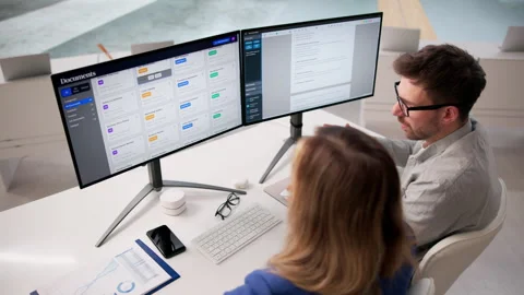 Cloud Security Manager Reviewing Online Database Records Stock Footage 332906849