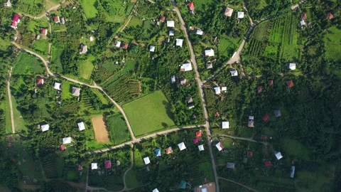 Cloud shadows and sunlight in the village Stock Footage 237853287