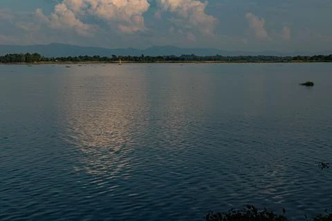 Cloud shadows drifting over forest-covered hills Stock Photos