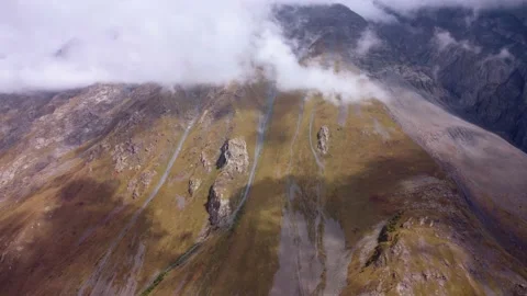 Cloud shadows on the mountain slope Stock Footage 168551669