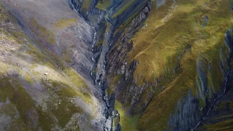 Cloud shadows on the mountain slope Stock Footage 243697875