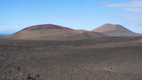 Cloud Shadows Moving Over Volcanic Landscape Timelapse 스톡 동영상 331751346