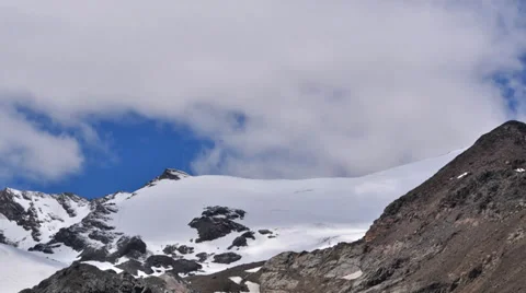 Cloud shadows over a glacier - time lapse Stock Footage 33830997