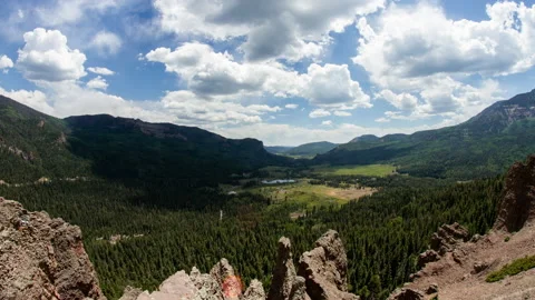Cloud shadows over mountain valley from rocky overlook timelapse Stock-Footage 154946363