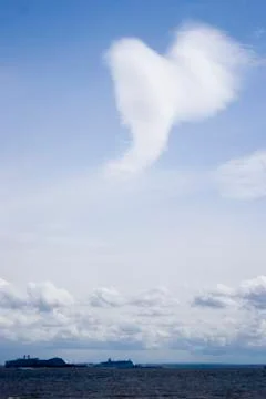 Cloud in the shape of an angel Stock Photos