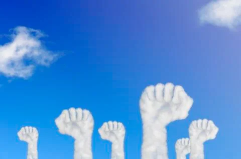 Cloud shape of hands raised fist air on blue sky. Stock Illustration