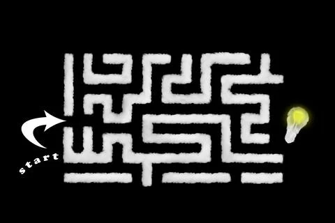 Cloud shape of labyrinth or maze start and finish with a light bulb on black Stock Illustration