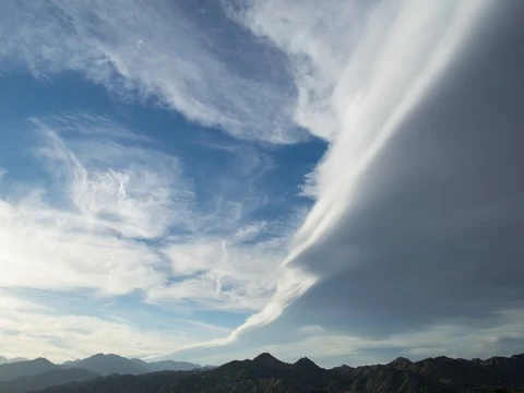 Cloud Shelf above Mountain Range Stock Footage 73609751