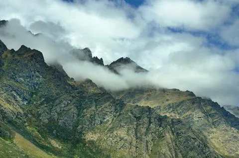 Cloud Shrouded Mountain Ridge Stock Photos
