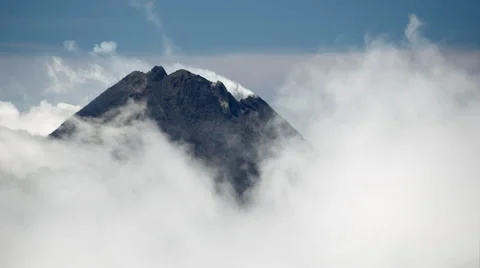 Cloud shrouded summit of Mount Merapi Stock Footage 45347248