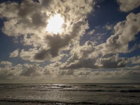 Cloud sky on the beach and beautiful tropical sea. Stock Photos