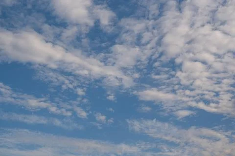 A cloud that is in the sky with the bottom right corner Stock Photos