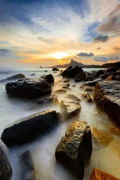Cloud, sky, mountain, rocks and sea background Stock Photos