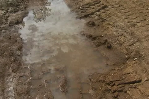 Cloud, Sky Reflection in puddle mud Time Lapse Stock Footage 10757562