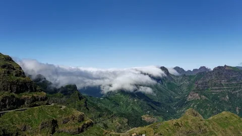 Cloud spilling over mountains Stock-Footage 237946033