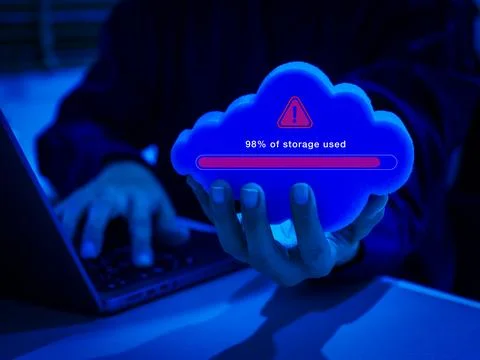 Cloud storage full concept with red warning icon, and progress bar showing .. Stock Photos
