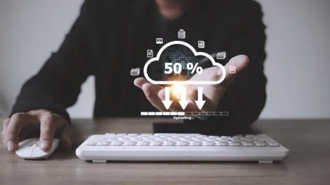 Cloud storage technology concept. Businessmen use laptops to synchronize do.. Stock Photos