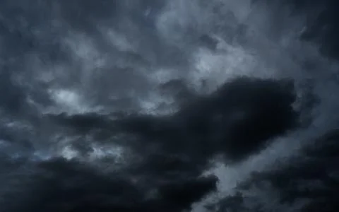 Cloud storm sky dark halloween background rain lightning thunder stoumy Stock Photos