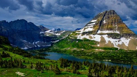 Cloud storms form above Bear Hat Mountain at Hidden Lake - Glacier Na Stock Photos