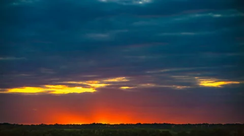 The cloud stream against the background of sunset. Time lapse Stock-Footage 64102833