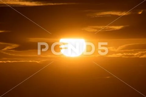 The cloud stream on the background of sunrise Stock Photos