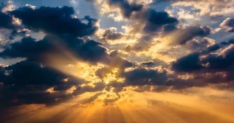 Cloud sun beam ray light warm orange color Stock Photos