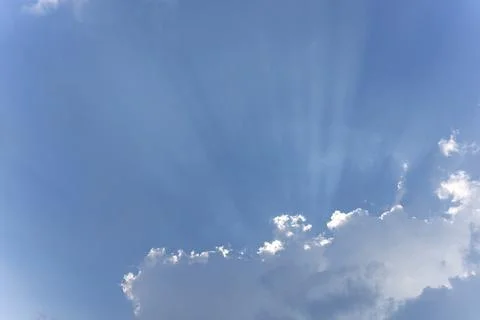 Cloud with sunbeam blue sky. ray from sky background image. Stock Photos