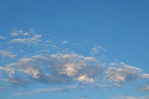 Cloud with sunlight and blue sky background. Stock Photos