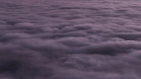 Cloud surface visible from above accompanied by lightning strikes in it Stock Footage 147150830