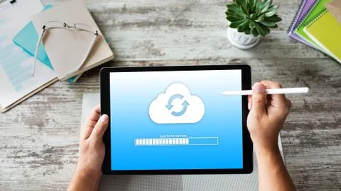 Cloud synchronization progress bar on tablet screen. Data storage and protection Stock-Fotos